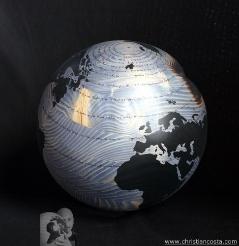 WW.B. - F. Kafka - La Sentenza -  (sfera azzurra) - 2013 - Legno, carbone e smalto - Diam. 30 cm
